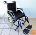 Invalidski voziček Meyra, z dodatnima zavorama in blazino