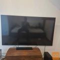 Samsung q65 (175cm) qled 4k smart tv +soundbar +woofer